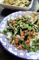 Pork and asparagus stir-fry with spicy cucumber salad