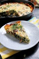 Brunch on potato crust quiche with spinach, feta and bacon